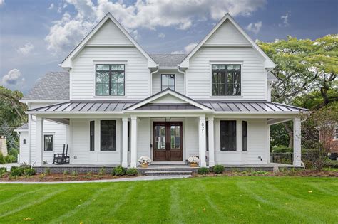 2 story farm house with metal roof|2 story metal roof exterior.